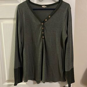 olive green thermal style top. non functioning buttons on front. loose fit